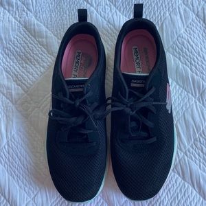Sketchers running shoes in black. Size 8. Barely Worn